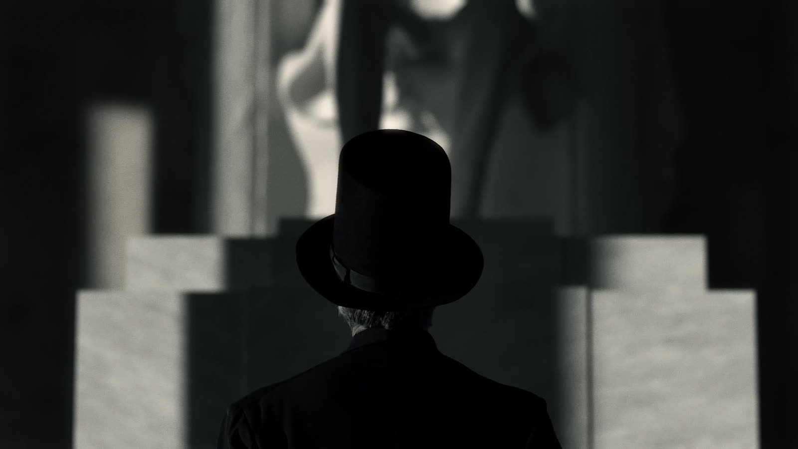 A fully CG Lincoln composited before the CG Lincoln Memorial in stark black and white